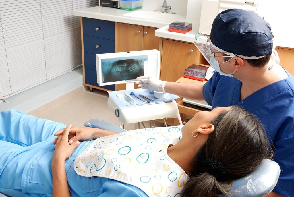 Dentist Showing Patient Xray